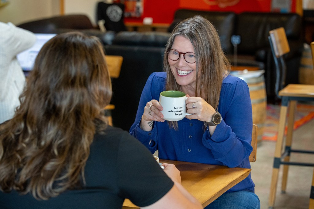 Megan Mulholland, Compass Communications